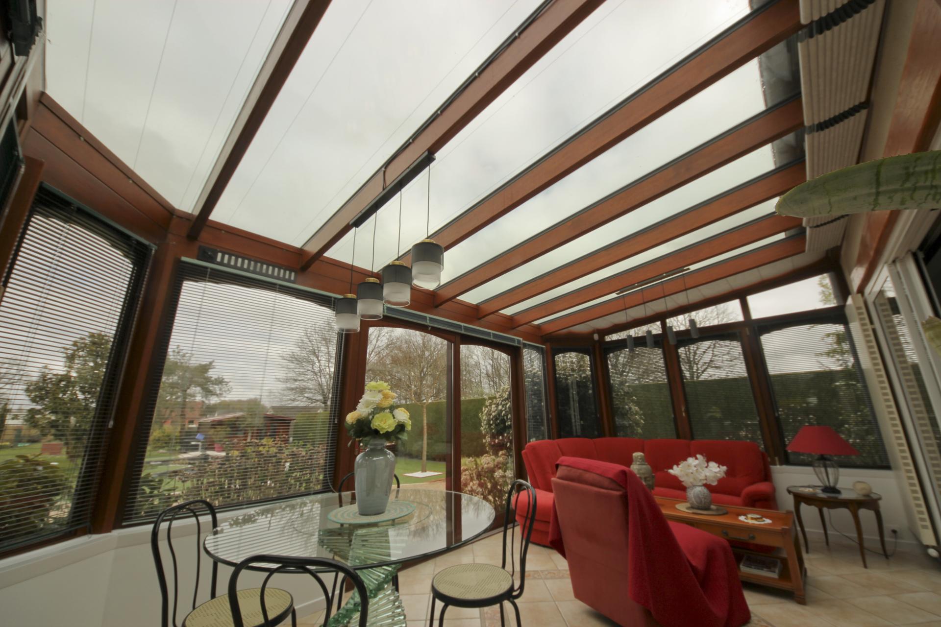 remplacement de vitrages de toiture d'une véranda