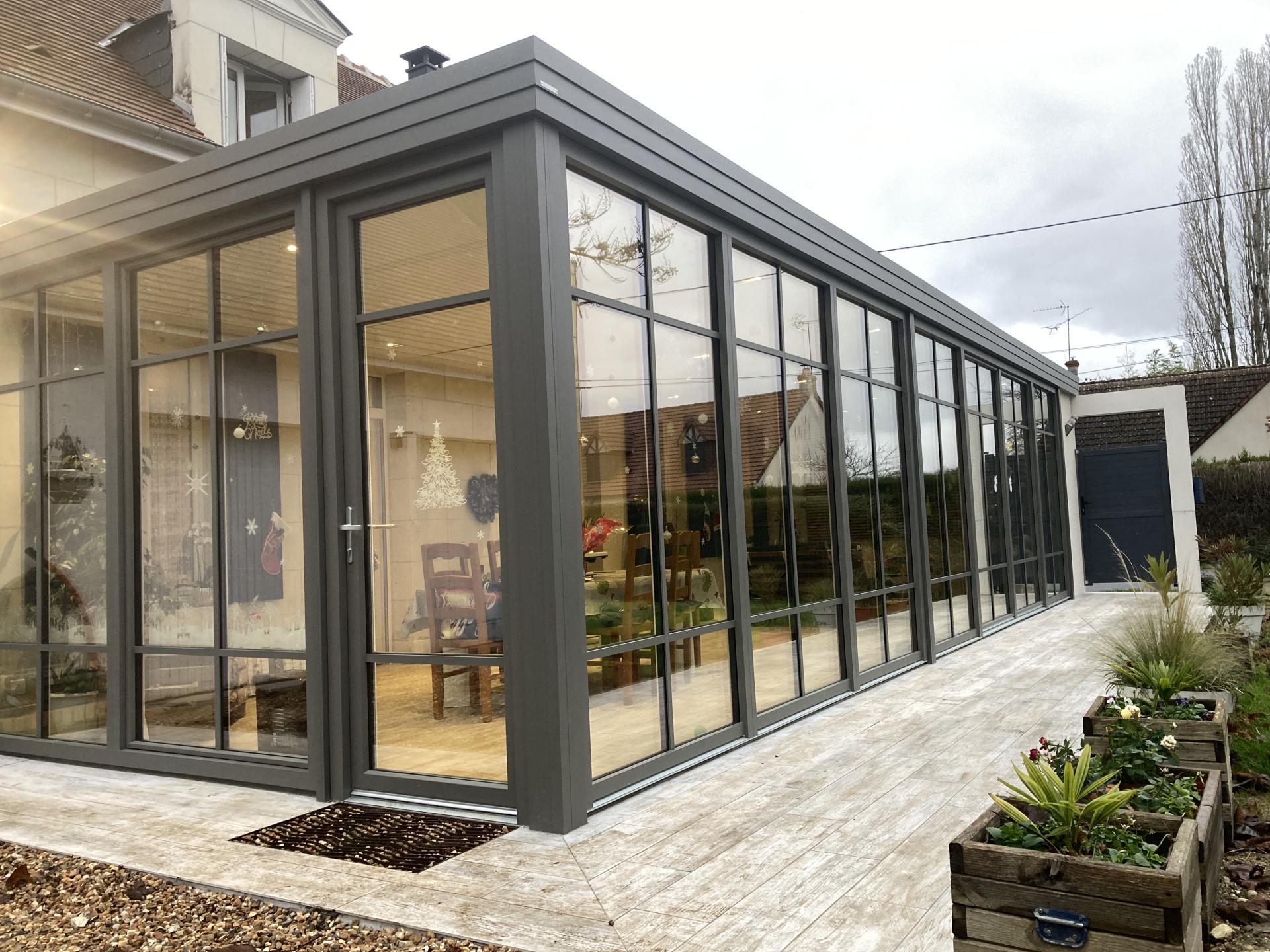 Véranda pièce à vivre, isolée contre le bruit et le froid 